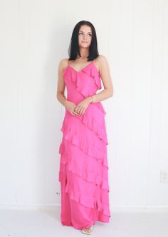 SLEEVELESS V-NECK RUFFLE TIERED MAXI DRESS 100% Polyester Hand Wash Model Specs Rachel is wearing a X-SMALL. Height: 5'4 Size: 00 Pre-draped Maxi Dress With Ruffles, Pink Tiered Sleeveless Dress With Ruffles, Tiered Ruffle Maternity Maxi Dress, Pink V-neck Maxi Dress With Ruffles, Purple V-neck Maxi Dress With Ruffles, Neck Ruffle, Tiered Maxi Dress, Ruffled Maxi Dress, Dress 100