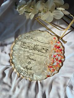 a glass plate with some flowers on it