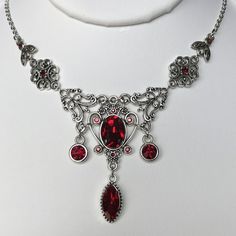 Red Gothic Metal Necklace, Red Gothic Necklace For Formal Occasions, Red Intricate Design Necklace For Party, Formal Red Necklaces With Intricate Design, Red Necklace With Intricate Design For Party, Formal Red Necklace With Intricate Design, Party Red Necklace With Intricate Design, Antique Red Necklace For Wedding, Ornate Red Wedding Necklaces