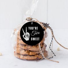 there is a bag of cookies in the shape of a hand that says you're time to sweet