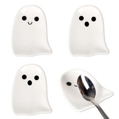 three spoons with ghost faces on them