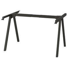 a black metal frame with two legs on the bottom and one leg raised up to the ground