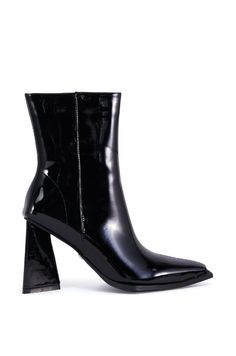 Boot up and conquer the world in The AZALEA WANG Kirigan Black Patent Bootie. These sleek beauties are crafted from a faux patent leather upper and feature a unique pointed toe with boxy trimming for a square silhouette, a chunky triangular heel, an ankle-high shaft, tonal stitching, and an inner ankle zipper closure with faux silver metallic hardware. Style with your favorite pair of jeans or a pleated skirt for a sexy, versatile ensemble you can take from day to night. (all measurements taken from size 7.5) - Faux Leather Upper - Pointed Square Toe - Chunky Heel - Ankle-High Shaft - 3.75” Heel Height - 6.5” Shaft Height - 11” Shaft Circumference - Imported Product ID: 428100 Conquer The World, Azalea Wang, Chunky Heel, Chunky Heels, Pleated Skirt, Patent Leather, Metallic Silver, Heel Height, Leather Upper