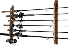 two fishing rods and reels hanging on a wall mounted rod holder with three hooks