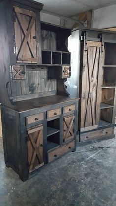 an old fashioned wooden cabinet with sliding doors