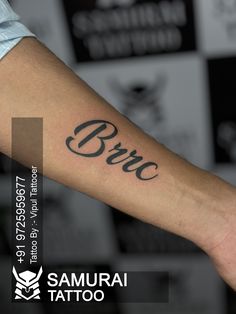 a person with a tattoo on their arm that says bric in cursive writing