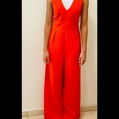 Red, Wide Leg, Very Elegant, This Jumpsuit Was Never Worn. Red Fitted V-neck Jumpsuit, Orange Jumpsuits And Rompers For Work, Fitted Orange Jumpsuits For Work, Orange Fitted Elegant Jumpsuit, Fitted Orange Jumpsuits And Rompers For Work, Elegant Fitted Orange Jumpsuits And Rompers, Elegant Fitted Orange Jumpsuit, Casual Red Jumpsuits And Rompers For Work, Red Summer Formal Jumpsuits