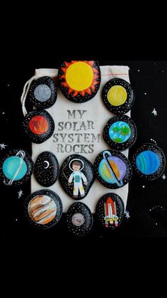 the solar system is made out of cupcakes and paper machches with space images on them