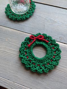 Christmas Wreath Crochet Coaster Pattern by MadebykamilleCrafts on Etsy Free Crochet Wreath Ornament Patterns, Crochet Wreath Pattern Freeknitted Christmas Wreath, Free Crochet Wreath Applique Patterns, Crochet Christmas Wreath Free Pattern Trees, Crochet Christmas Wreath Free Pattern Red Hearts, Crochet Christmas Tree Wreath, Knitted Wreath Patterns, Knitted Christmas Wreath Pattern, Christmas Wreaths Crochet Free