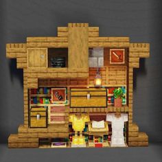 an image of a house made out of legos and wood blocks with furniture in it