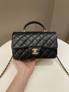 Chanel Quilted Top Handle Mini RectangularBlack Lambskin LGHWSize 20 x 12.5 x 6.5 cmChain drop 53 cmMicro ChipNov 20218/10 Good (some corners side edges rub, base and under flap scratches otherwise great. Well structured)Includes full set box, dust bag and receiptPrice now 4900 sgd 3680 usd CN6041-01 Designer Bags Louis Vuitton, Side Edges, Quilted Top, Gold Ounce, Small Bag, Full Set, Chanel Bag, Bottega Veneta, Luxury Bags