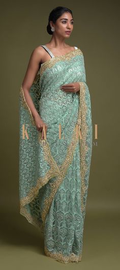 Buy Online from the link below. We ship worldwide (Free Shipping over US$100)  Click Anywhere to Tag Tea Green Saree In Net Adorned With Turq Thread Embroidered Floral Heritage Pattern Online - Kalki Fashion Tea green saree in net adorned with turq thread embroidered floral heritage pattern along with kundan and pearls.Border enhanced with zardozi and sequins embroidery in floral. Tea Green, Green Saree, Sequins Embroidery