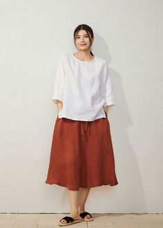 This soft linen tops is elegant and stylish.  It is a wonderful wardrobe staple that's a timeless classic you'll wear again and again. ★★FEATURES 100% Linen blouse Round neckline 3/4 sleeves Minimalist Linen blouse Pleated detail at shoulder and cuffs Loose linen tops Perfect for Summer, Spring, autumn You can shop the matching skirt from this link. https://www.etsy.com/listing/1660289722 ★★ Bespoke Order Service If you Request other color Request the length Your height is not between 155 cm- 17 Womens Linen Tops, Handmade Tops, White Linen Top, Linen Tops, Linen Top Women, Blouse Casual, Linen Blouse, Linen Top, Linen Women