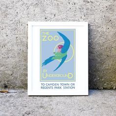 there is a poster on the wall that says the zoo by underground to camden town or regents park station