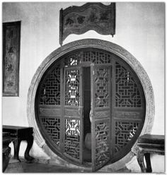 an ornately designed door is shown in this black and white photo