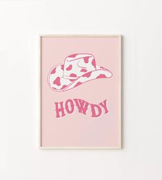 a pink poster with the words howdy printed on it and a cowboy hat