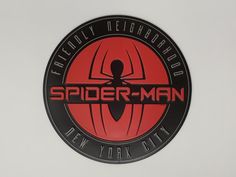 the logo for spider - man new york city is shown in black and red on a white background