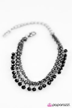 Faceted black beads trickle from the wrist. Infused with layers of silver chain, the glittery beading catches and reflects the light, creating a sparkling fringe. Features an adjustable clasp closure. Sold as one individual bracelet. Get The Complete Look! Necklace: “Who Needs Fireworks? - Black” (Sold Separately) P9RE-BKXX-080AU Black Bracelet, Paparazzi Accessories, Black Bracelets, Black Beads, Fireworks, Black Fashion, Silver Chain, Beading, Silver Necklace