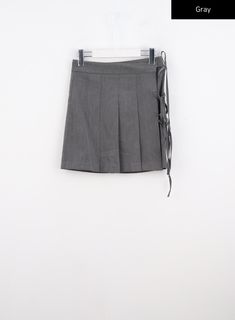 wrap-pleated-mini-skirt-co330 / Gray Fitted Cotton Short Pleated Skirt, Fitted Short Cotton Pleated Skirt, Short Fitted Cotton Pleated Skirt, Summer Cotton Pleated Skirt For Work, Casual Tie Waist Mini Wrap Skirt, Summer Cotton Mini Wrap Skirt, Trendy Lined Wrap Skirt For Summer, Fitted Pleated Wrap Skirt For Spring, High Waist Cotton Pleated Skirt For Work