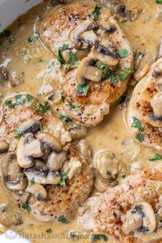 chicken with mushroom sauce in a white pot