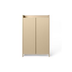 a tall beige cabinet with two doors