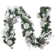 the letter n is made up of pine cones, silver balls and fir branches with white lights