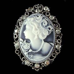 "PERFECT CHRISTMAS / VALENTINE / MOTHER'S DAY GIFT !! PERFECT GIFT /WEDDING GIFT FOR BRIDE / BRIDESMAID / LADY! This Classy, Antique look BLACK Cameo pendant / Pin with Swarovski crystals measures 1 1/2\" wide X 2 1/8\" high (38mm X 53mm). And it can be a beautiful pendant also because there is a hole at the back. Crystal Color: Black Diamond, Jet Black It goes well with modern as well as vintage styling...it really depends how you want to wear it. Great piece for your collection! Prices are in Elegant Silver Brooch For Christmas, Victorian White Wedding Brooches, White Cameo Wedding Brooches, White Cameo Brooches For Wedding, White Cameo Brooch For Wedding, Christmas Wedding Jewelry With Rhinestones, Christmas Wedding Rhinestone Jewelry, Wedding Jewelry With Rhinestones For Christmas, Elegant Christmas Brooches For Formal Occasions