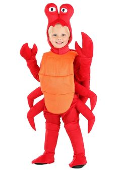 a little boy in a lobster costume