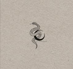 a black and white drawing of a snake