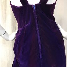 "This is a great beaded dress from the early 1990s. The body of the dress is fitted with a long side slit. The beadwork goes around the neckline in a rope design with fringe. The beads are iridescent gold, black, purple and blue. See the condition for a description of the velvet. This is a deadstock item from Thomas Brothers country store in central Pennsylvania. The store was shown in American Pickers (season 18, episode 10.) Details Size: '12', fits like a modern 4 - 6 Chest: 38\" Straps: 18\" Velvet Dress 90s, American Pickers, Purple Maxi, Purple Maxi Dress, Long Black Coat, Retro Sweatshirts, 1970s Dresses, Goddess Dress, Retro Tops