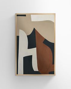 an abstract painting hangs on the wall