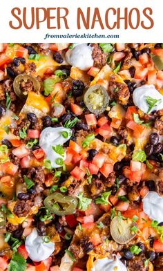 this mexican salad is loaded with black beans, tomatoes, cheese and other toppings