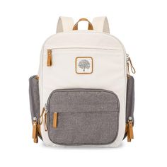 a white and grey backpack with a tree on the front pocket, zippers at the bottom