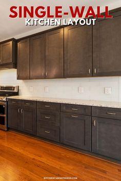 a kitchen with black cabinets and white counter tops that says single - wall kitchen layout