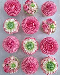 cupcakes decorated with pink and white flowers