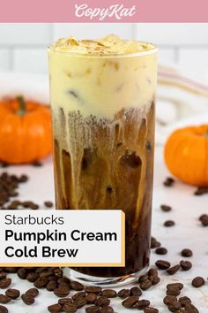 starbucks pumpkin cream cold brew with coffee beans on the side and text overlay that reads starbucks pumpkin cream cold brew