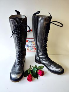 I have a selection of more than 500 pair of RARE, VINTAGE Dr Martens boots. Please visit my SHOP to check out my other DOCs. I will be listing new ones every day.  Dr Doc Martens zip 20 hole silver 1B60 knee high tall boots UK6 EU39 US8 Let me know in case you have any questions Silver Punk Boots For Winter, Doc Martens Original, Dr. Martens 1b60 Bex Knee-high Boot, Silver Leather Knee-high Boots, Gothic High-top Combat Boots With Rivets, Doc Marten Gothic Americana, Vintage Dr Martens, Gothic Lace-up Platform Boots With Metal Feet, Martens Boots