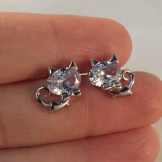 Beautifully Crafted Classic Design Zircon Cat Stud Earrings 18k White Gold Filled With Large Oval Sparkling Simulated Diamond Topaz Zircon Gemstones. Top Quality, High Polished Shine, Brand New, Never Been Worn. Lead, Nickel Free. These Earrings Sparkle. Perfect Jewelry For Any Day, Special Occasion Gift Anniversary Banquet Dating Birthday Promise Prom Dance Holiday Party Christmas Stocking For Yourself Mom Women Daughter Sister Granddaughter Teen Or Friend. Free $18 Gift Of Your Choice In My Li Cat Stud Earrings, Cat Earrings Studs, Prom Dance, Sparkle Earrings, Christmas Stocking, Holiday Party, Party Gifts, Classic Design, Gold Filled