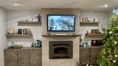 a living room with a christmas tree and fireplace