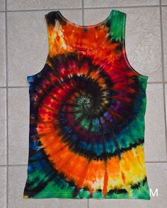 Unisex size tank tops Heavy cotton 5.3 oz These are ready to ships and receive thr exact item in listing photo. These ship the next day unless purchased with a made to order then it will ship when those are finished. Festival Acid Wash Cotton Tank Top, Acid Wash Cotton Tank Top For Festivals, Cotton Festival Tank Top, Acid Wash Cotton Tank Top, Tie Dye Cotton Sleeveless Tank Top, Cotton Tie Dye Tank Top For Festivals, Cotton Tie-dye Tank Top For Festival, Hand Dyed Cotton Tank Top, Hand Dyed Tie Dye Sleeveless Tank Top