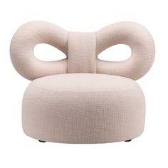 an upholstered chair with large eyes on it's back and two legs