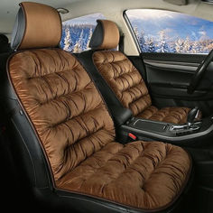 the interior of a car with brown leather seats and black trimmings on it