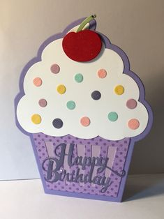 a cupcake card with an apple on top