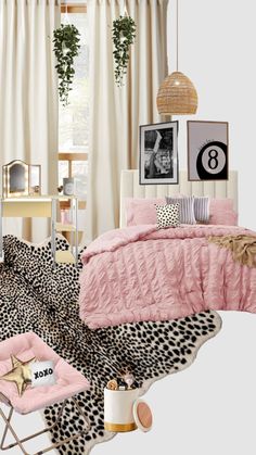 the bedroom is decorated in pink and black with leopard print on the bedding, chair, desk, mirror, and pictures