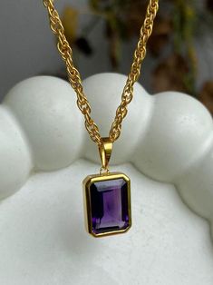 Sterling silver 925  Discover our Exquisite February Birthstone Pendant, featuring a vibrant rectangular purple amethyst. This elegant handcrafted necklace is designed for women who appreciate fine jewelry. Ideal as a delightful birthday gift, this pendant shines with timeless. Key Features: Authentic African Amethyst: Sourced from the rich lands of Africa, this pendant features a genuine purple amethyst, known for its deep violet hues and clarity. Unique Rectangular Cut: The amethyst is expertl Luxury Rectangular Amethyst Jewelry, Luxury Purple Rectangular Jewelry, Purple Rectangular Jewelry As A Gift, Purple Rectangular Jewelry For Gifts, Purple Rectangular Jewelry Gift, Rectangular Purple Amethyst Necklaces, Purple Rectangular Amethyst Necklaces, Purple Amethyst Rectangular Jewelry, Rectangular Purple Amethyst Jewelry