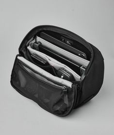 A revolutionary all-in-one solution designed to streamline your daily tech essentials and keep you organized on the go. It’s a triple threat: tech pouch, desk caddy, and sling bag all in one. Portable Workstation, Desk Caddy, Tech Essentials, Tech Pouch, Functional Desk, Green Interiors, Tablet Sleeve, Triple Threat, Eco Friendly Fabric