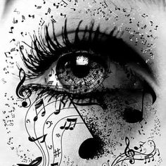 a woman's eye with musical notes and music notes painted on the side of her face