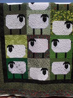 there is a quilt made to look like sheep