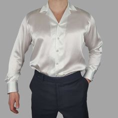 Our white silk dress shirt is the epitome of sophistication and elegance. With it's glossy white finish, you will undoubtedly make a statement wherever you go. This shirt is highly breathable, making it perfect for all types of weather, ensuring you stay fresh and cool while enjoying your island vacation. It's also hypoallergenic, making it ideal for those with sensitive skin. The comfort and satisfaction you gain from wearing this shirt will elevate your mood and fill you with good energy. The Luxury Men's White Shirt, Luxury Fitted Shirt For Wedding, Silk Dress Shirt, Silk Shirt Men, Satin Shirts, White Silk Dress, Silk Shirt Dress, Island Vacation, Stay Fresh