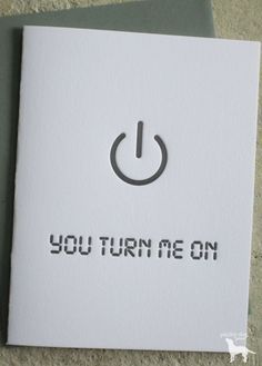 a white card with the words you turn me on